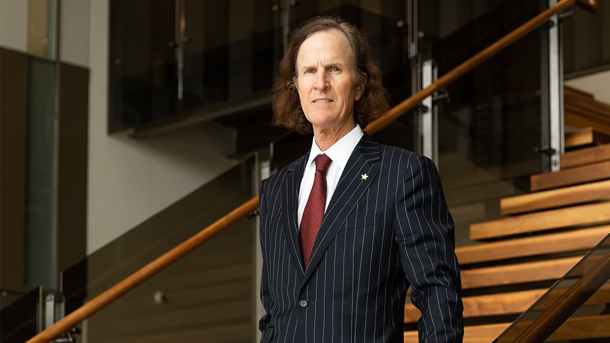 Mark Anderson, M.D., discussing a site visit interview