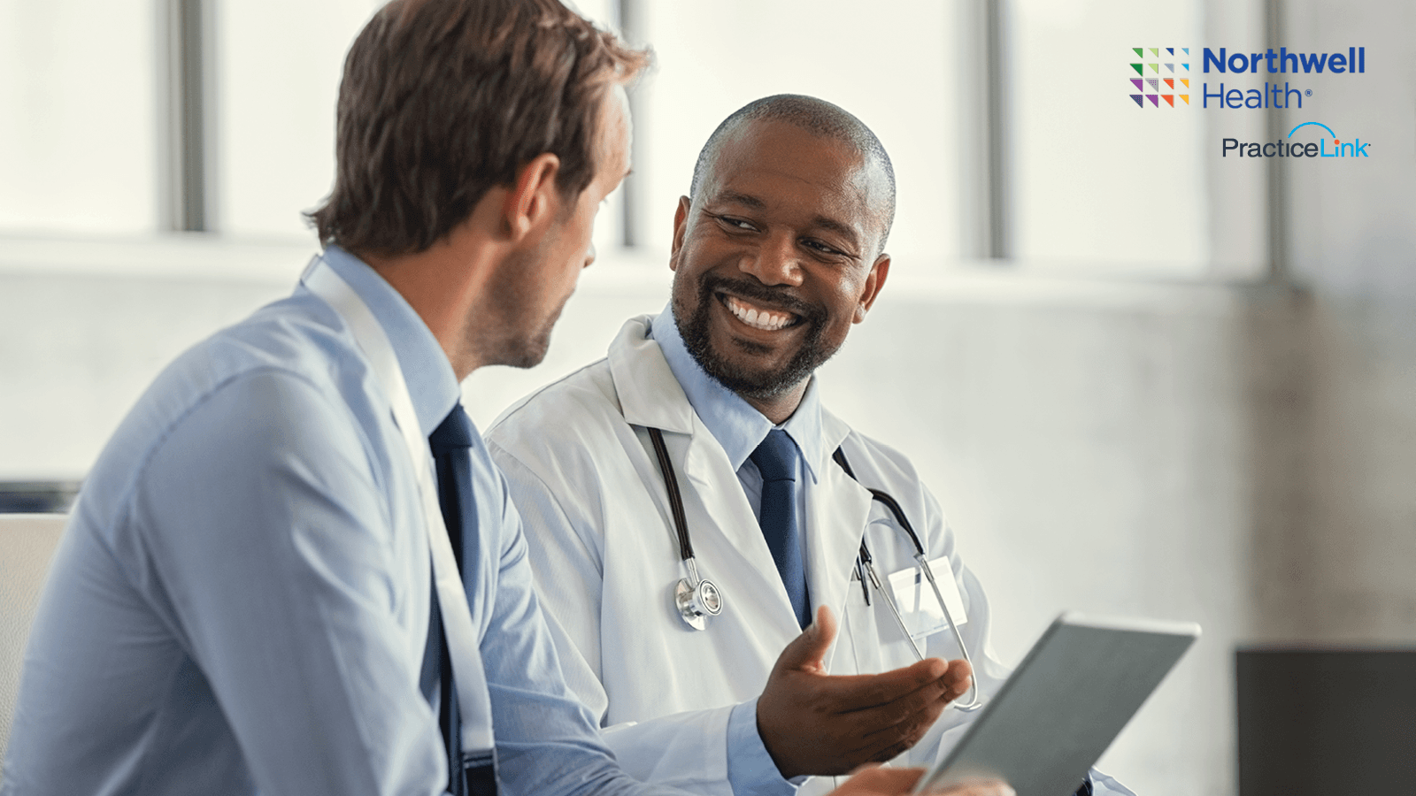 Image of doctors speaking.